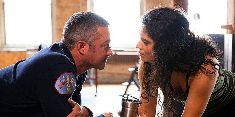 Kelly Severide and Stella Kidd intensely staring at each other on Chicago Fire