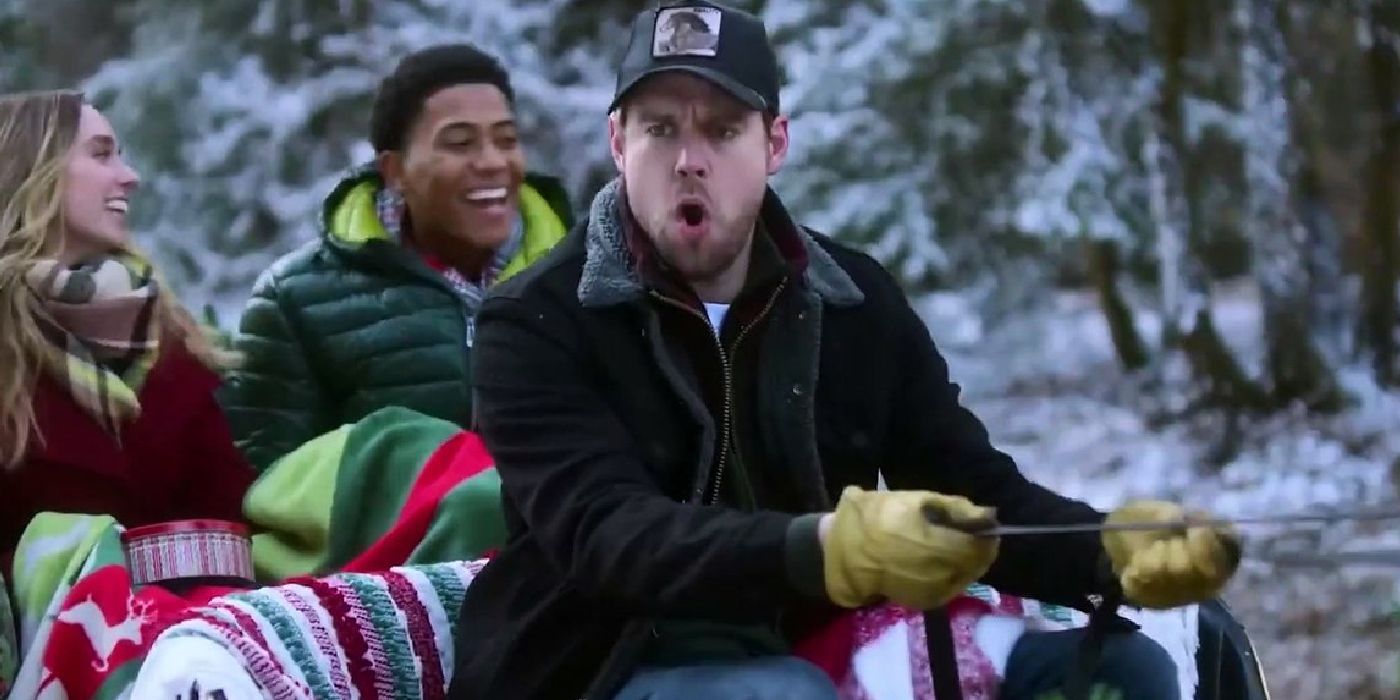 Jake driving a sled of people on Falling for Christmas 