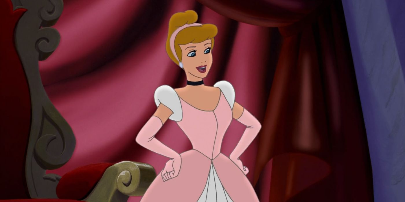 Cinderella in a pink dress with her hands on her hips. 