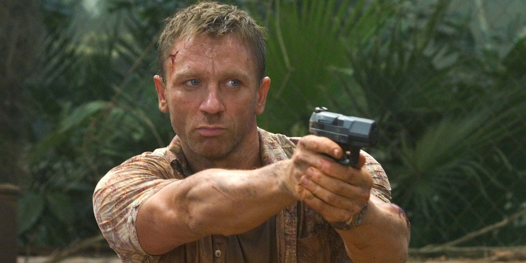 Photo of Daniel Craig holding a gun at Casino Royale