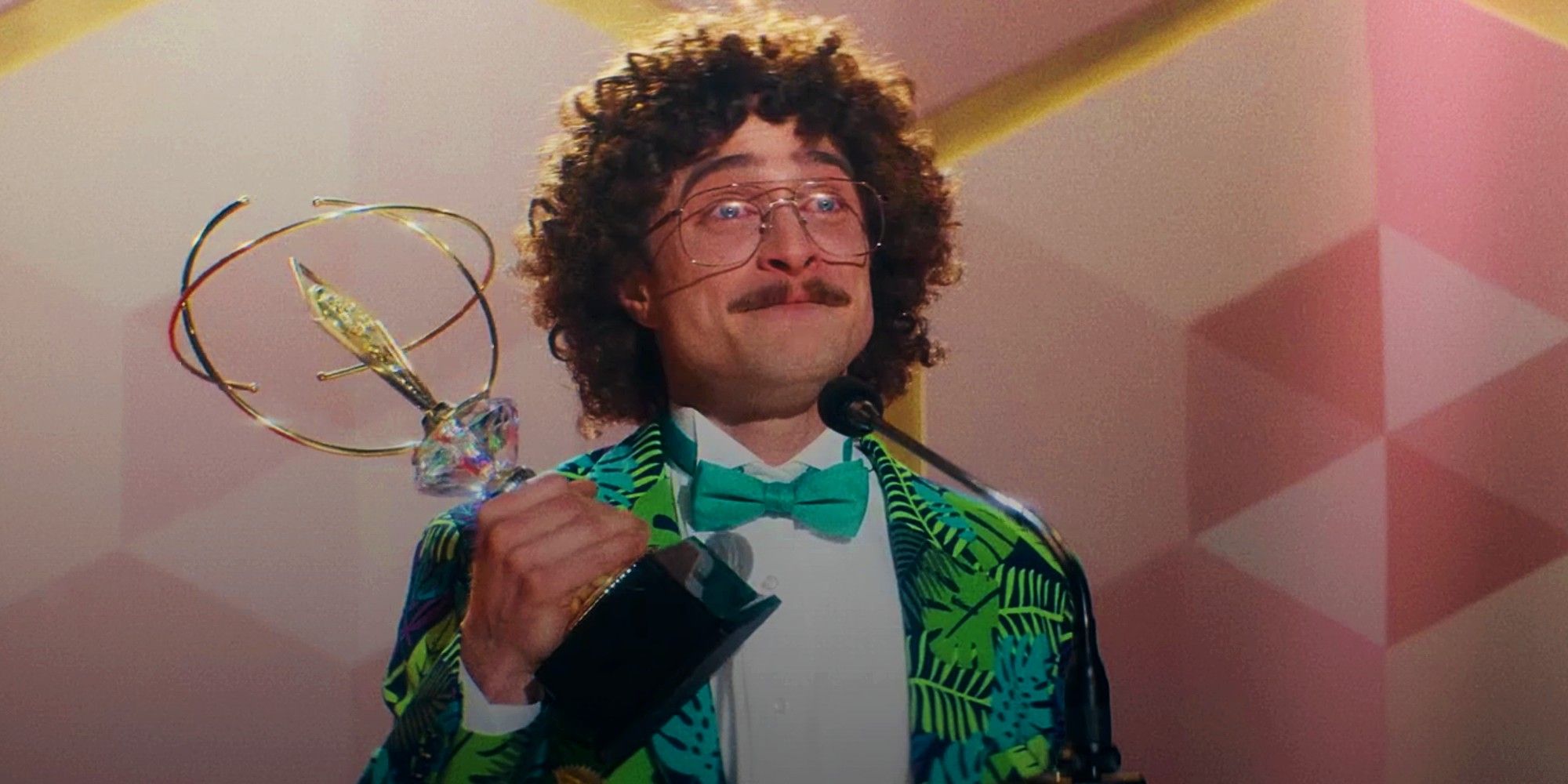 Daniel Radcliffe as Weird Al receiving an award.