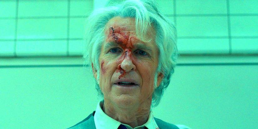 Dr Brenner (Matthew Modine) with blood on his face in Hawkins Lab in Stranger Things 4