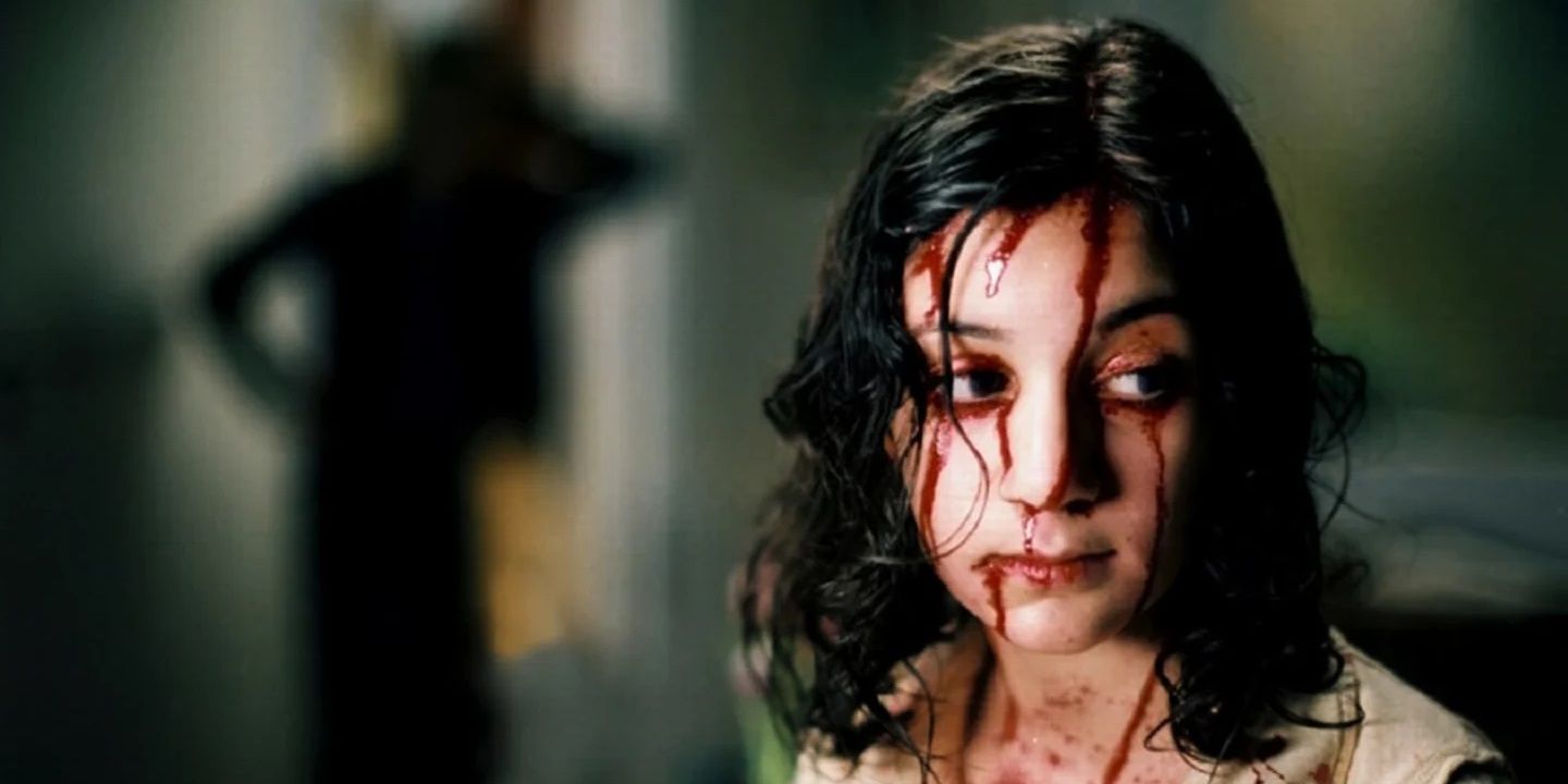 Eli (Lina Leandersson) covered in blood in Let the Right One In