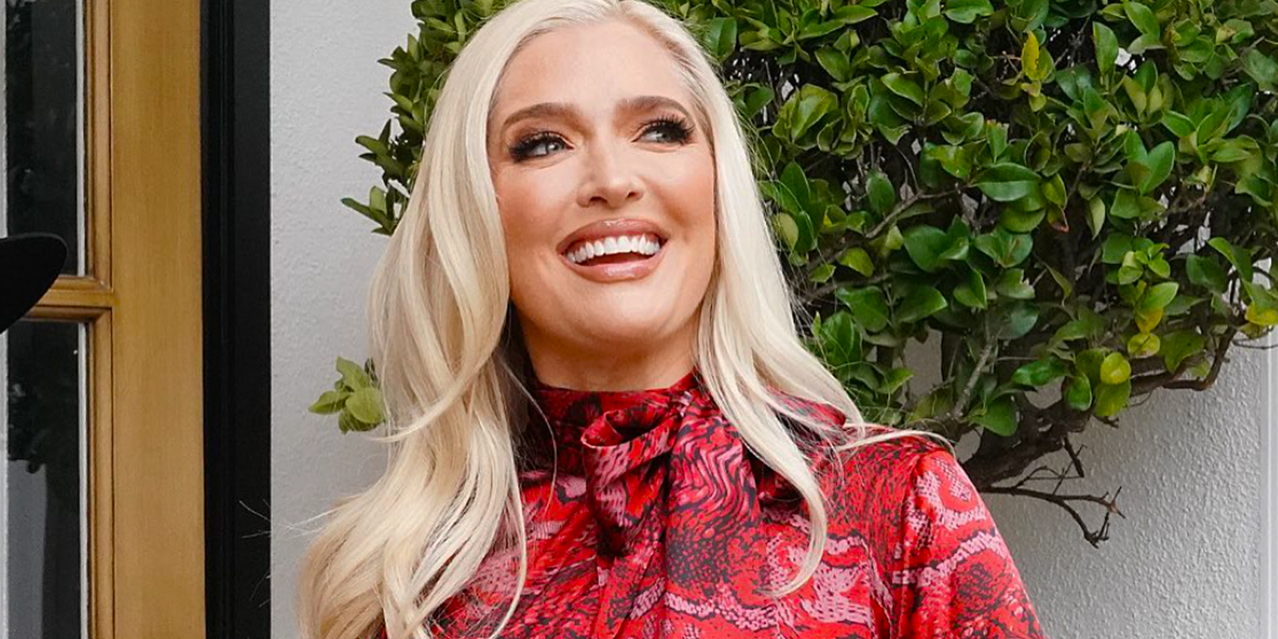 Erika Jayne From The Real Housewives of Beverly Hills wearing red dress smiling long hair
