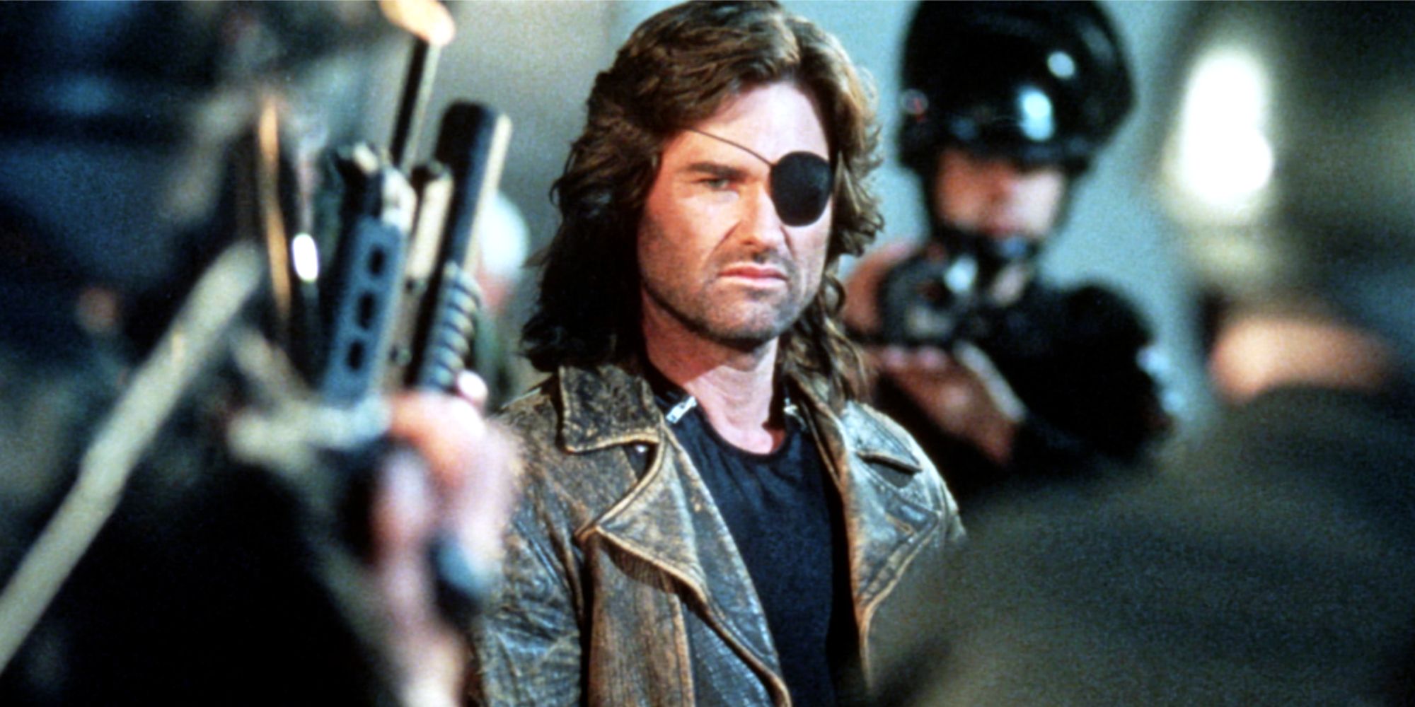 Kurt Russell surrounded by soldiers in Escape from New York