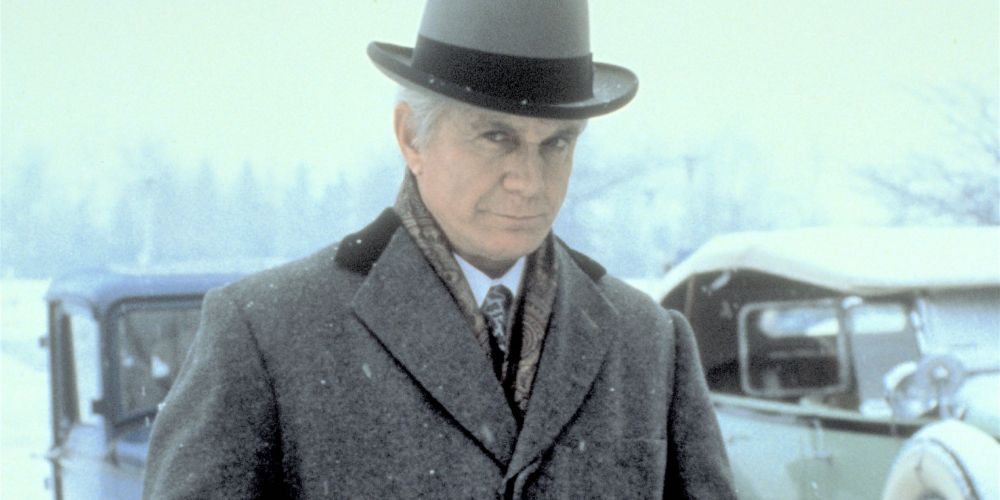 Henry Ford walks in the snow in Ford:The Man And The Machine (1987)
