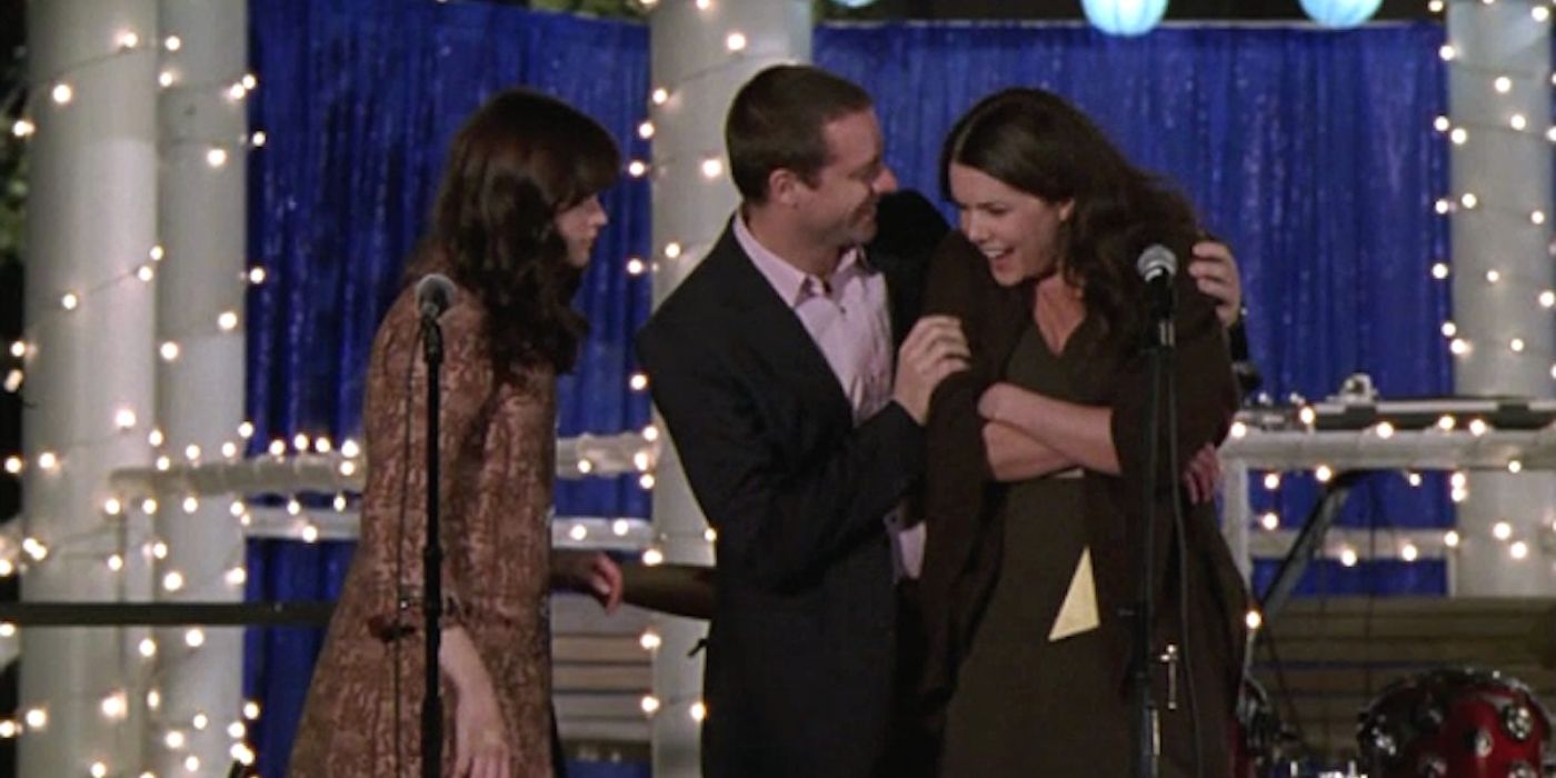 Rory and Christopher helping Lorelai at Lane's wedding on Gilmore Girls
