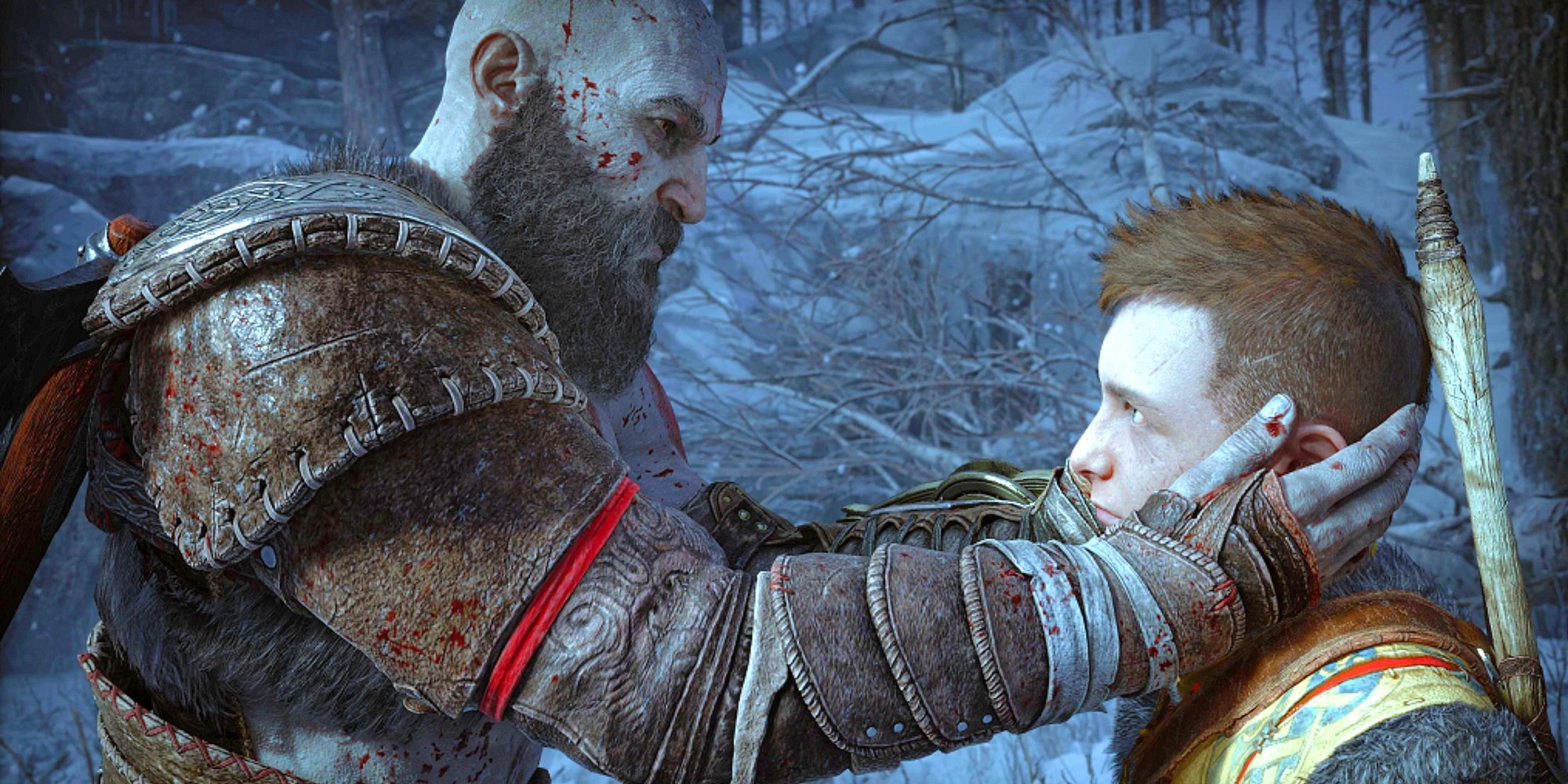 Imagem de Kratos segurando o rosto de seu filho Atreus em um tocante momento de vulnerabilidade.