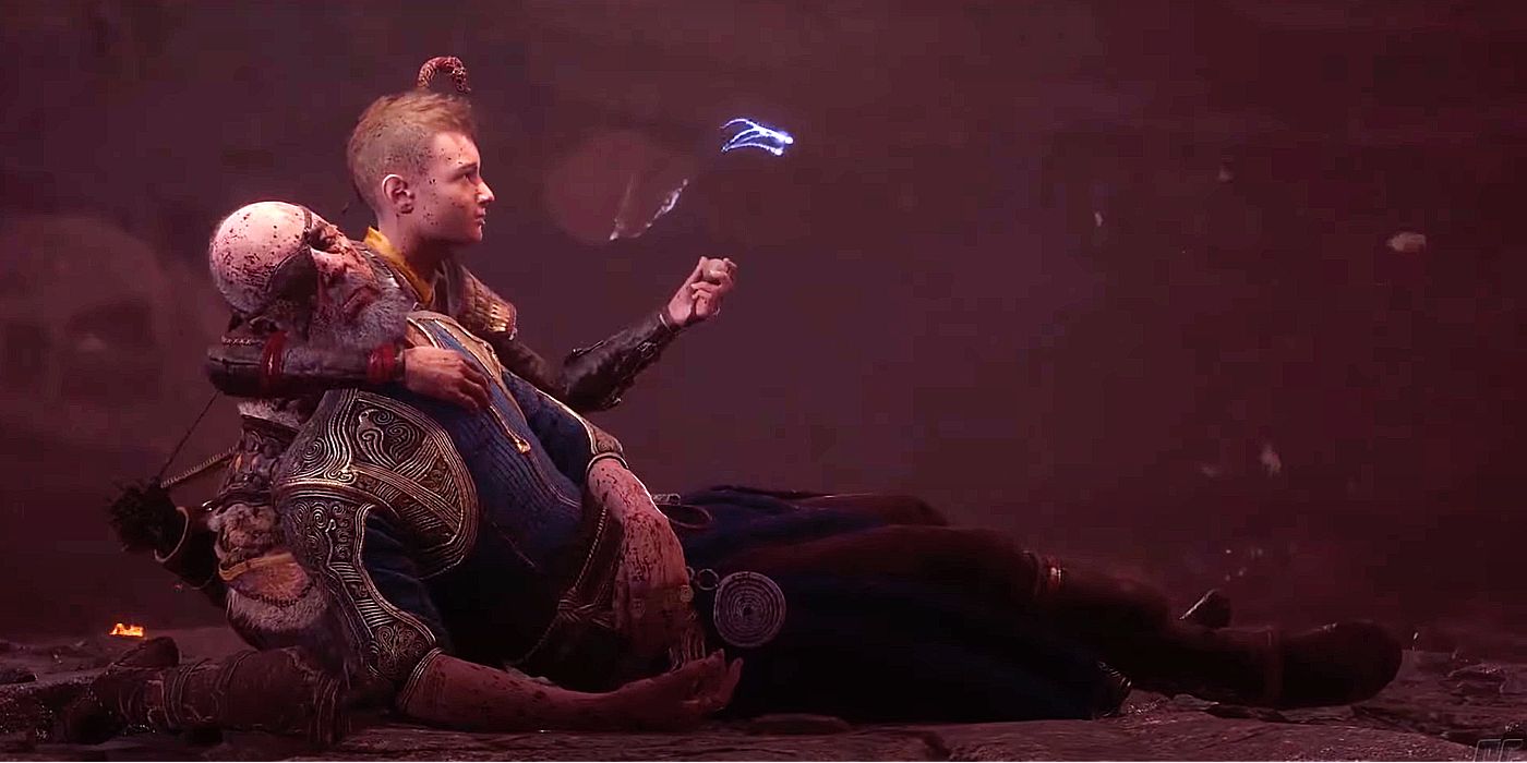 Image of Atreus holding Odin's body as his soul floats in front of them.