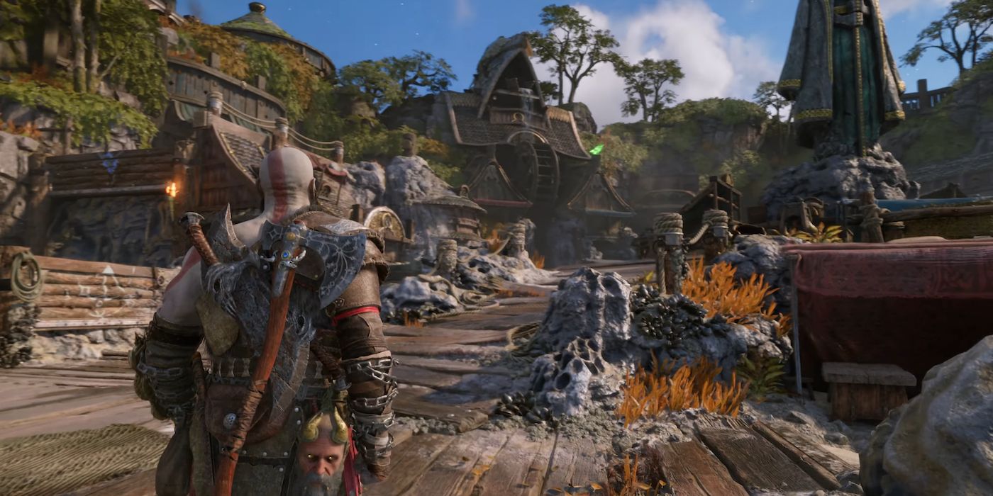 Kratos walking through a town in Svartalfheim in God of War Ragnarök.