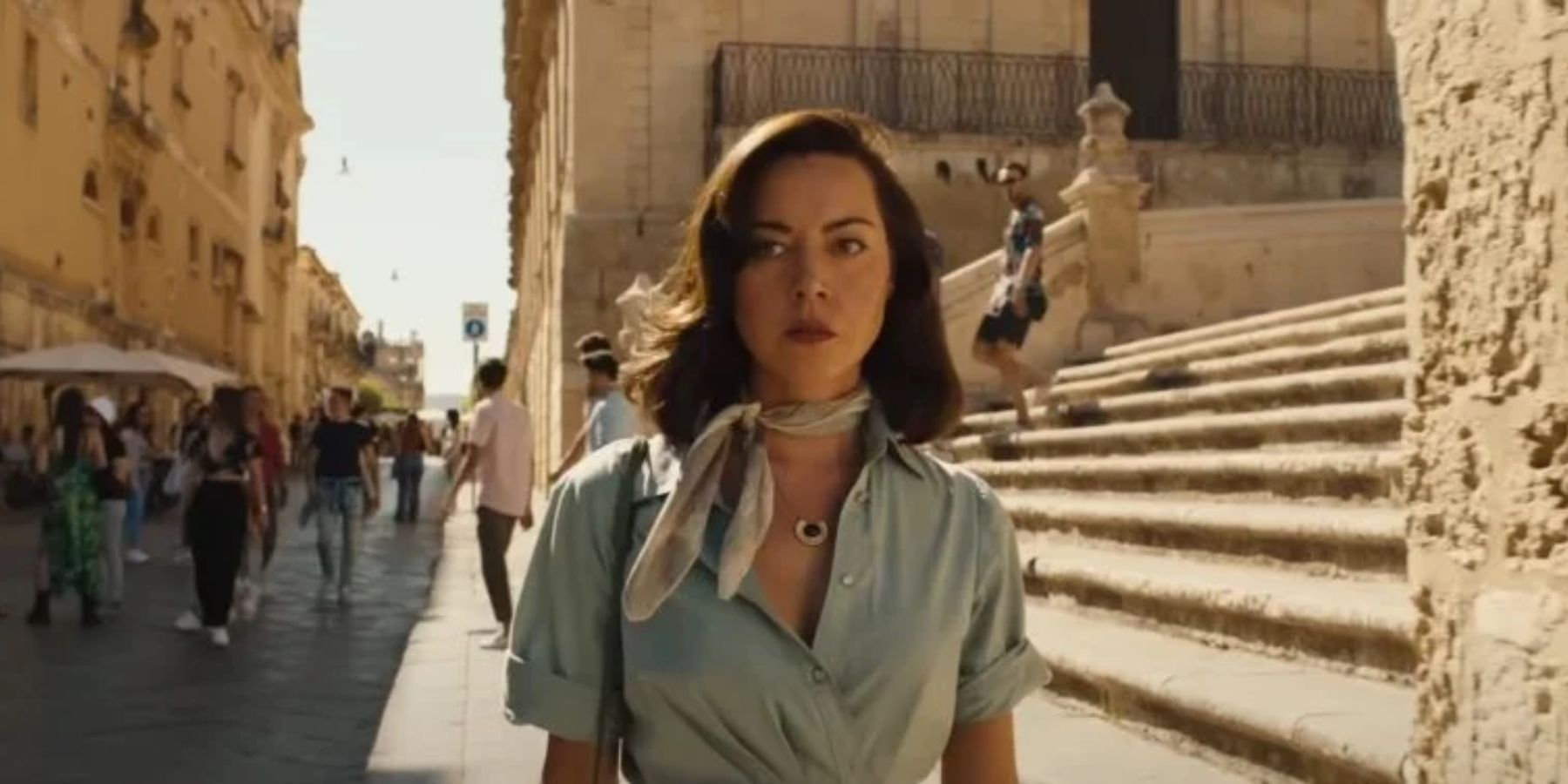 Aubrey Plaza's Harper Spiller wanders the streets of Noto in The White Lotus season 2.