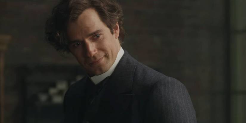 Sherlock Holmes (Henry Cavill) smiling warmly in Enola Holmes 2.