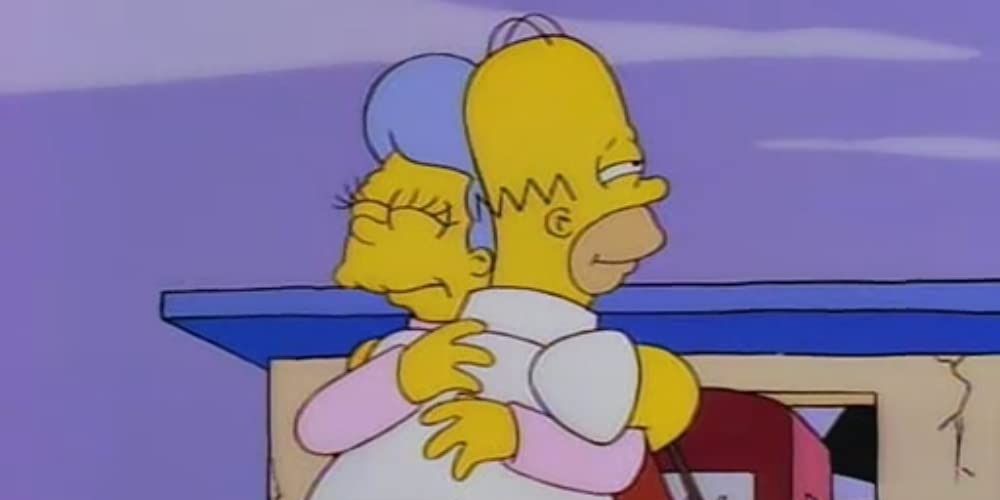 Homer embrasse Mona dans Les Simpson