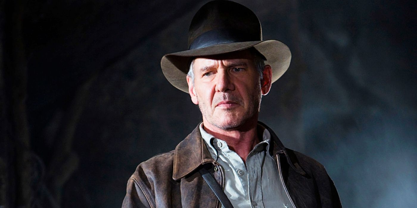 Harrison Ford as Indiana Jones, looking down while in outfit