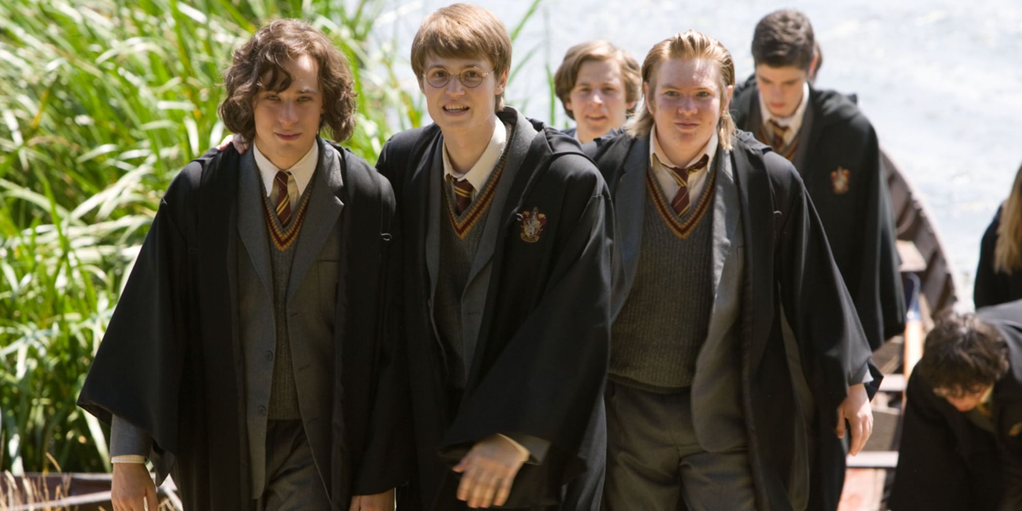 The Marauders walking together in Harry Potter. 