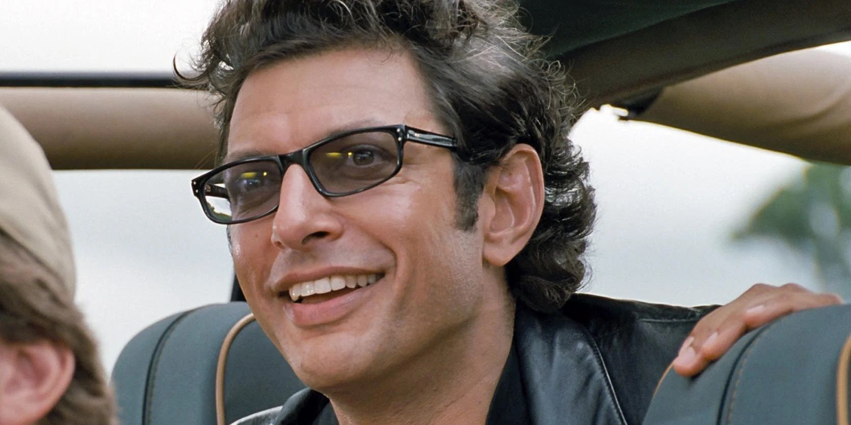 Jeff Goldblum smiling in Jurassic Park