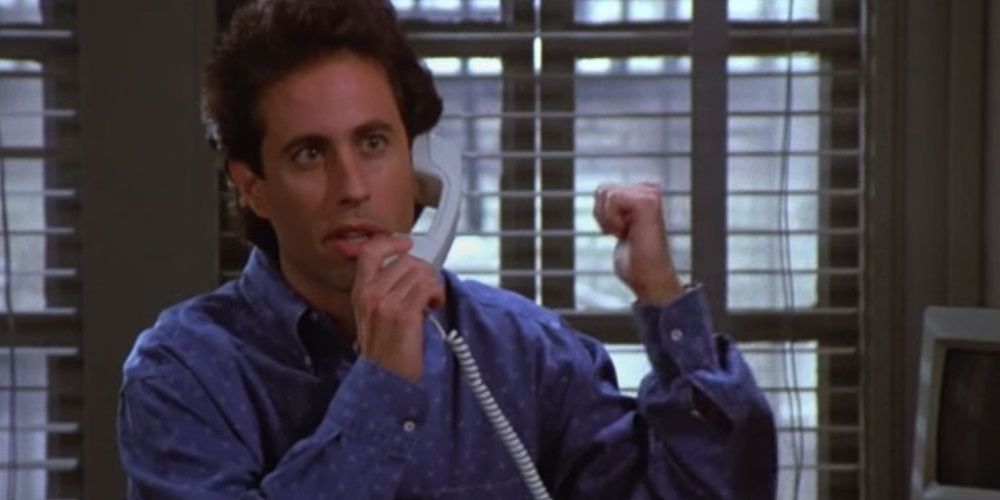 Jerry utilisant un téléphone à deux lignes à Seinfeld