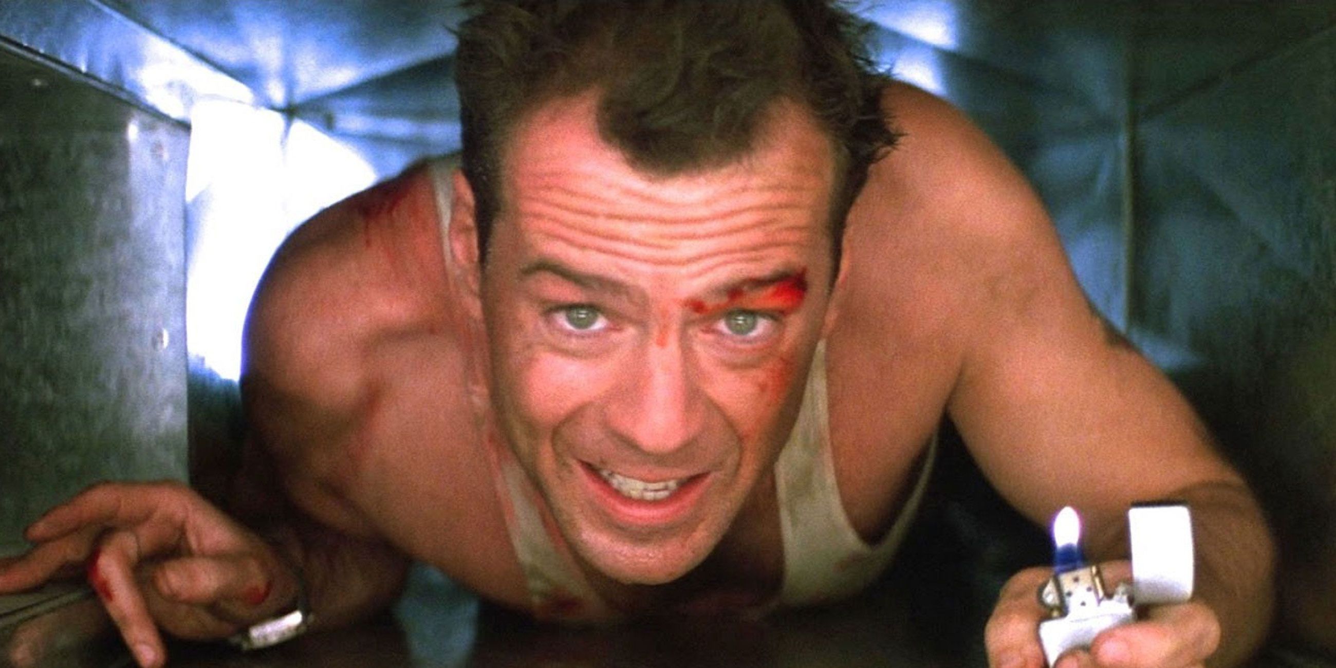John McClane dans un évent dans Die Hard