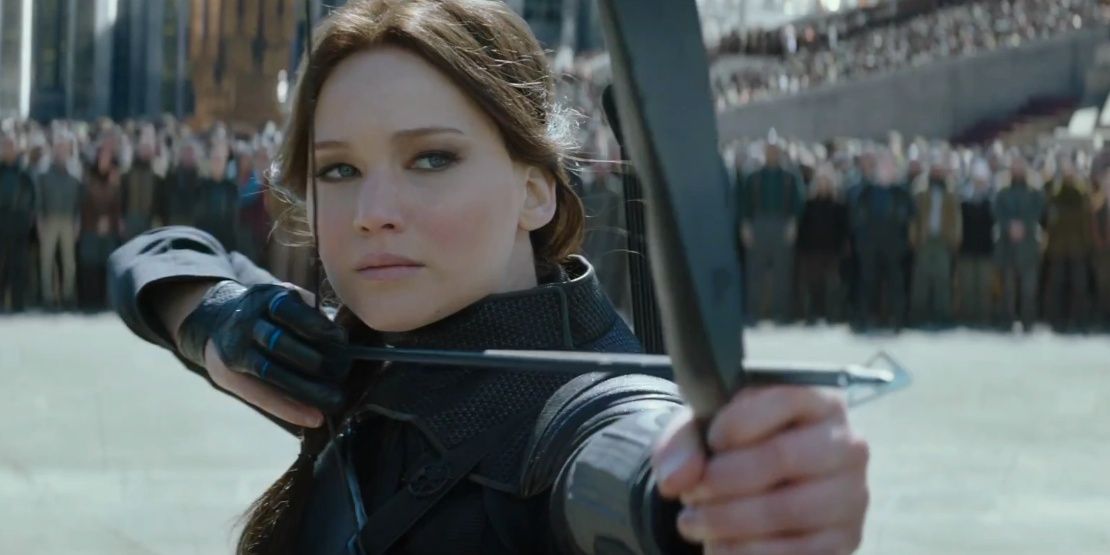 Katniss Everdeen training her bow in The Hunger Games Mockingjay 