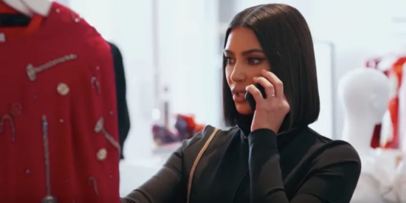 Kim Kardashian talking on a cell phone in a store on Keeping Up With The Kardashians