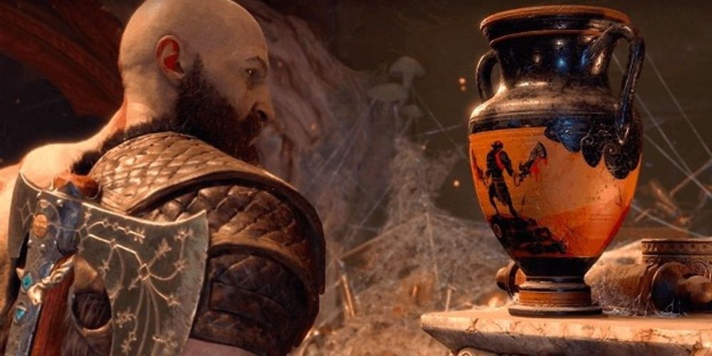 Kratos looking at a vase in God of War 