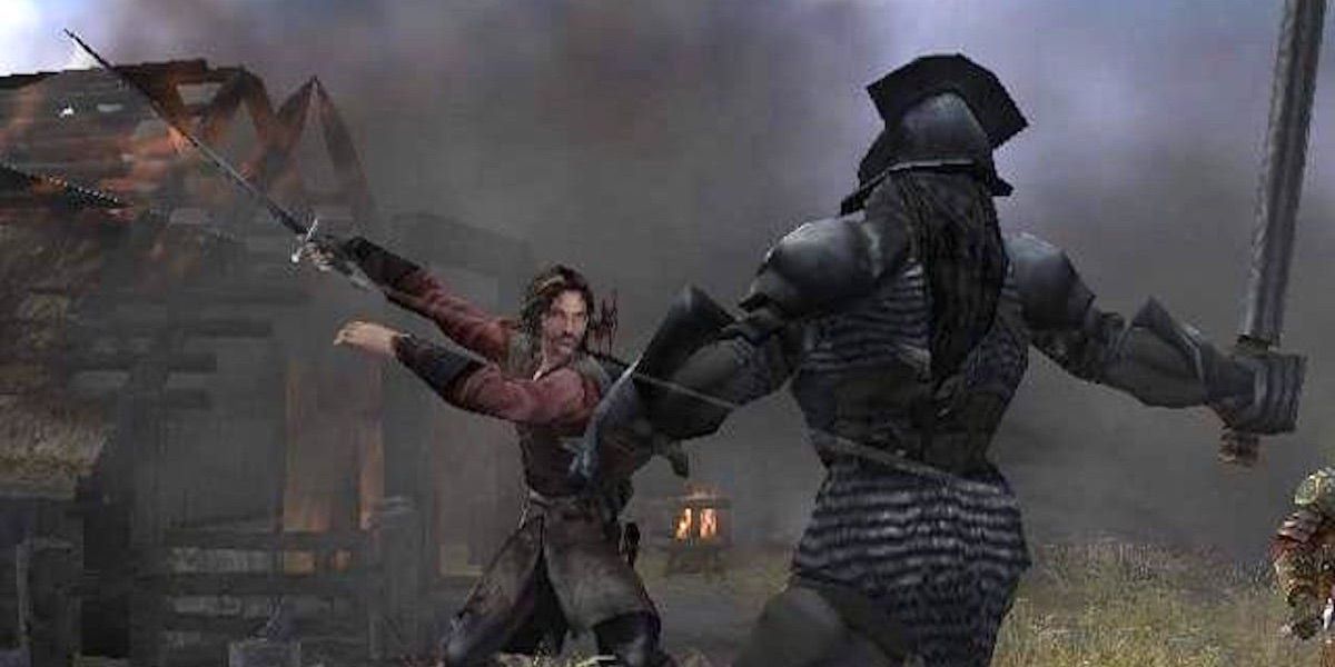Aragorn, Yüzüklerin Efendisi: İki Kule video oyunundan bir Ork ile savaşıyor 