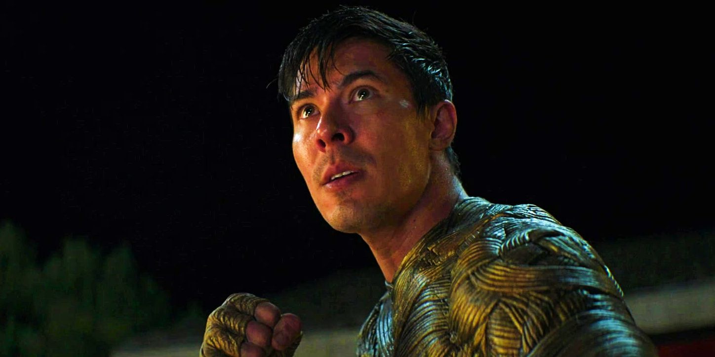 Lewis Tan as Cole Young fighting Goro in Mortal Kombat