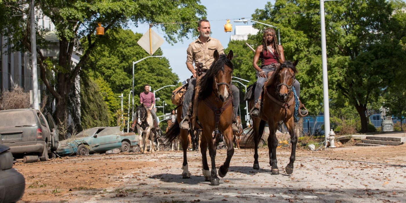 Gambar Rick dan gengnya sedang berkendara di jalan The Walking Dead