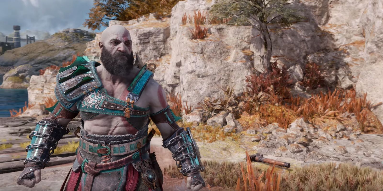Kratos dressed in Mani's Wisdom, an armor set in God of War Ragnarok.