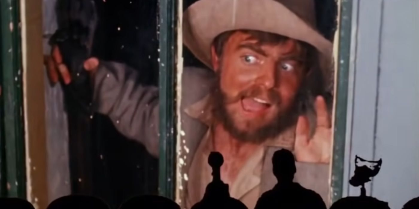 Tom Servo, Joel, and Crow watching the film Manos' the Hands of Fate.