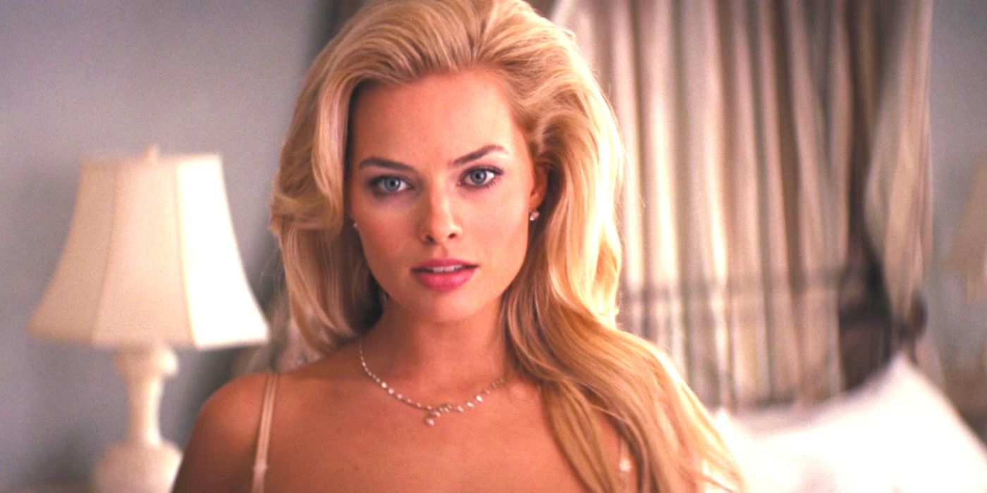 Margot Robbie as Naomi in The Wolf of Wall Street in the bedroom with her hair loose and hanging down