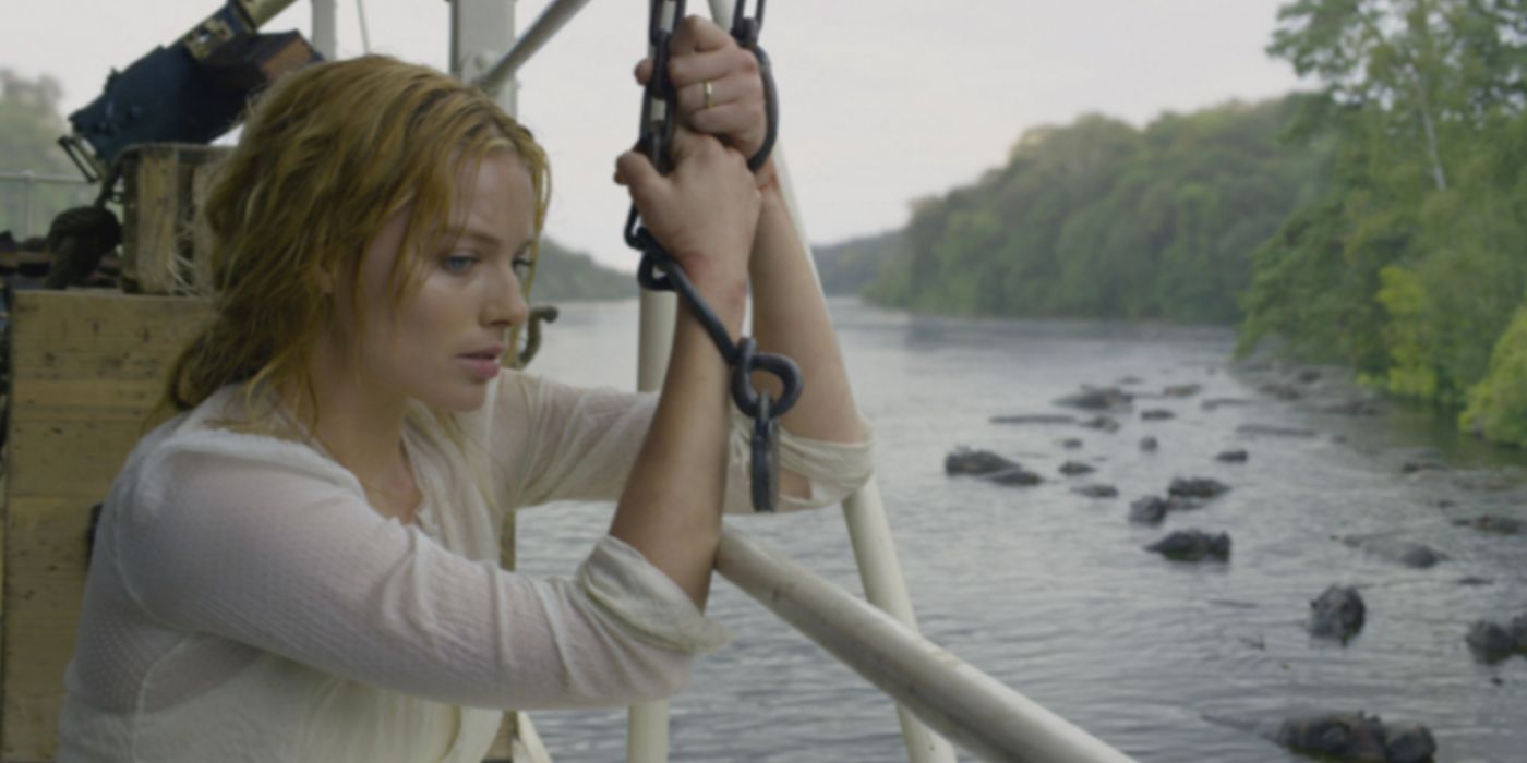 Margot Robbie as Jane tied up on a boat in The Legend of Tarzan