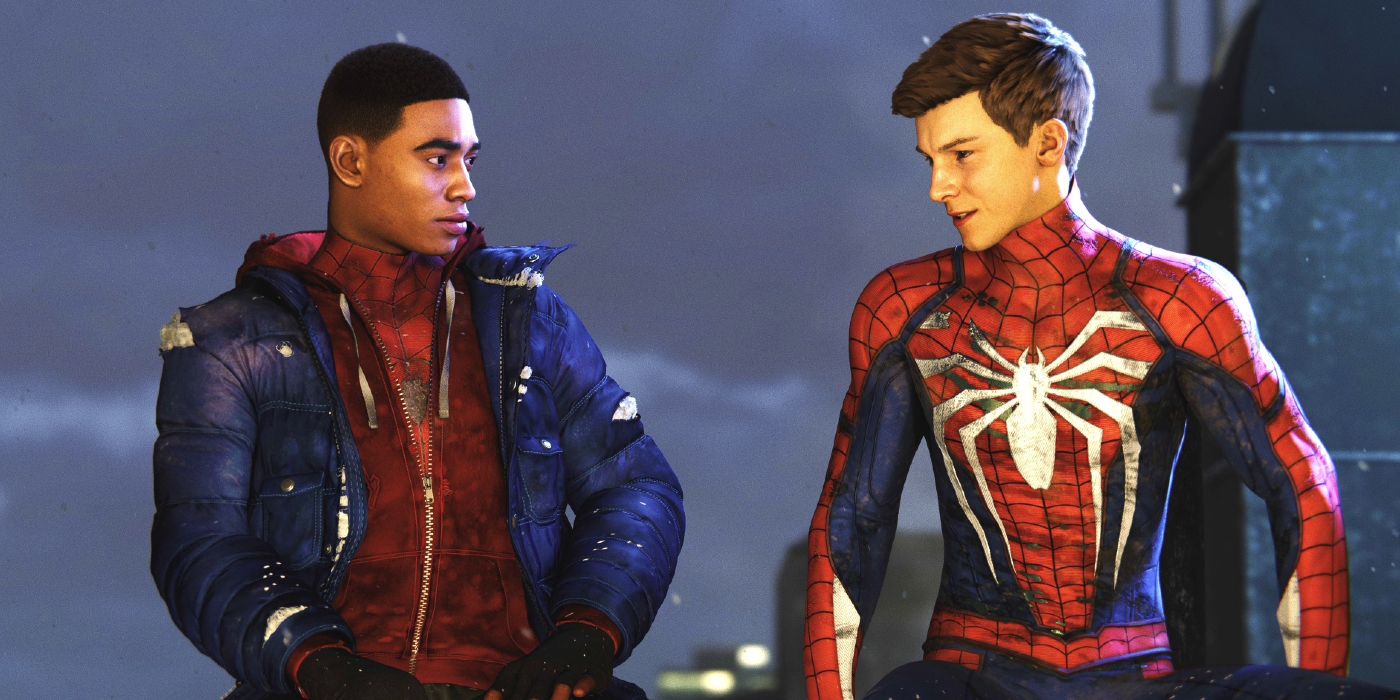 Image of Miles Morales and Peter Parker in their tattered Spider-Man costumes, perched on a New York rooftop at nighttime in Marvel's Spider-Man: Miles Morales. Both Peter and Miles are unmasked.