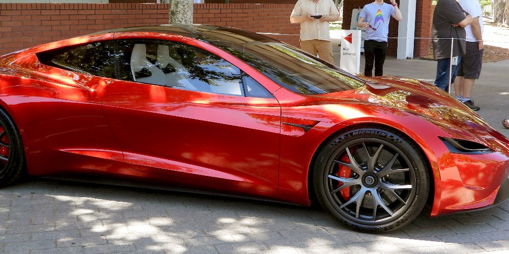 A red Tesla Roadster Second Generation is seen parked