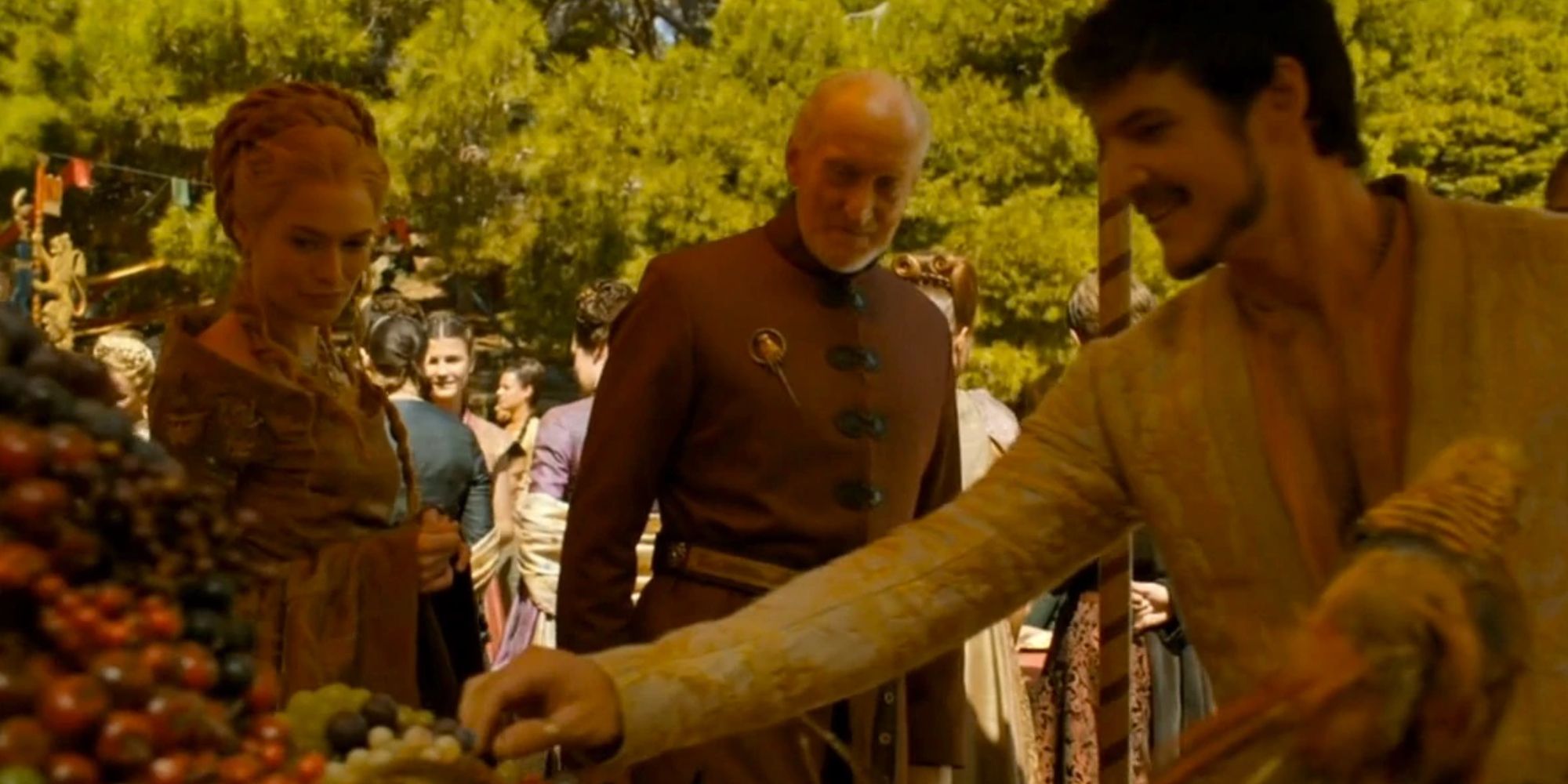 Oberyn, Cersei, and Tywin at Joffrey's wedding in Game of Thrones