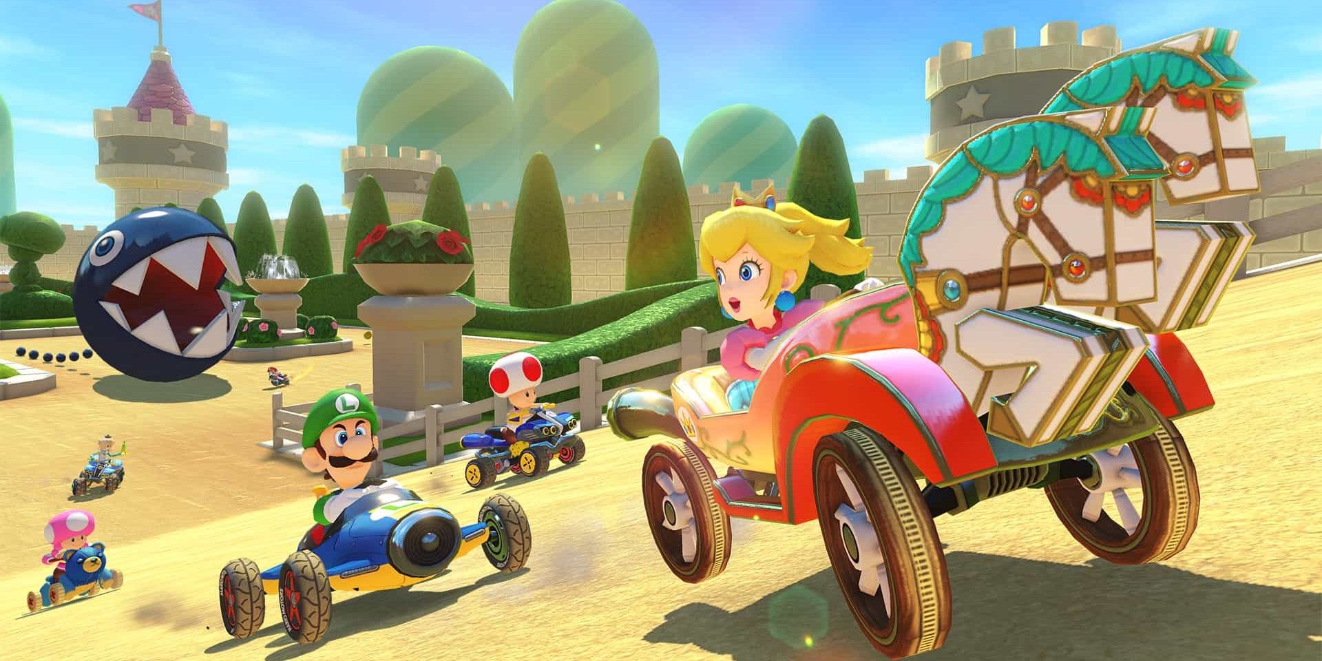 Peach Garden Mario Kart 8 com Peach na frente e Luigi, Toad, Toadette e um Chain Chomp atrás dela.