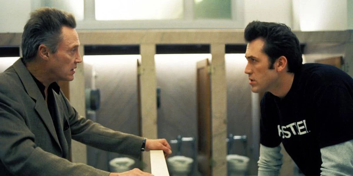 Christopher Walken lectures a man in Poolhall Junkies in the bathroom