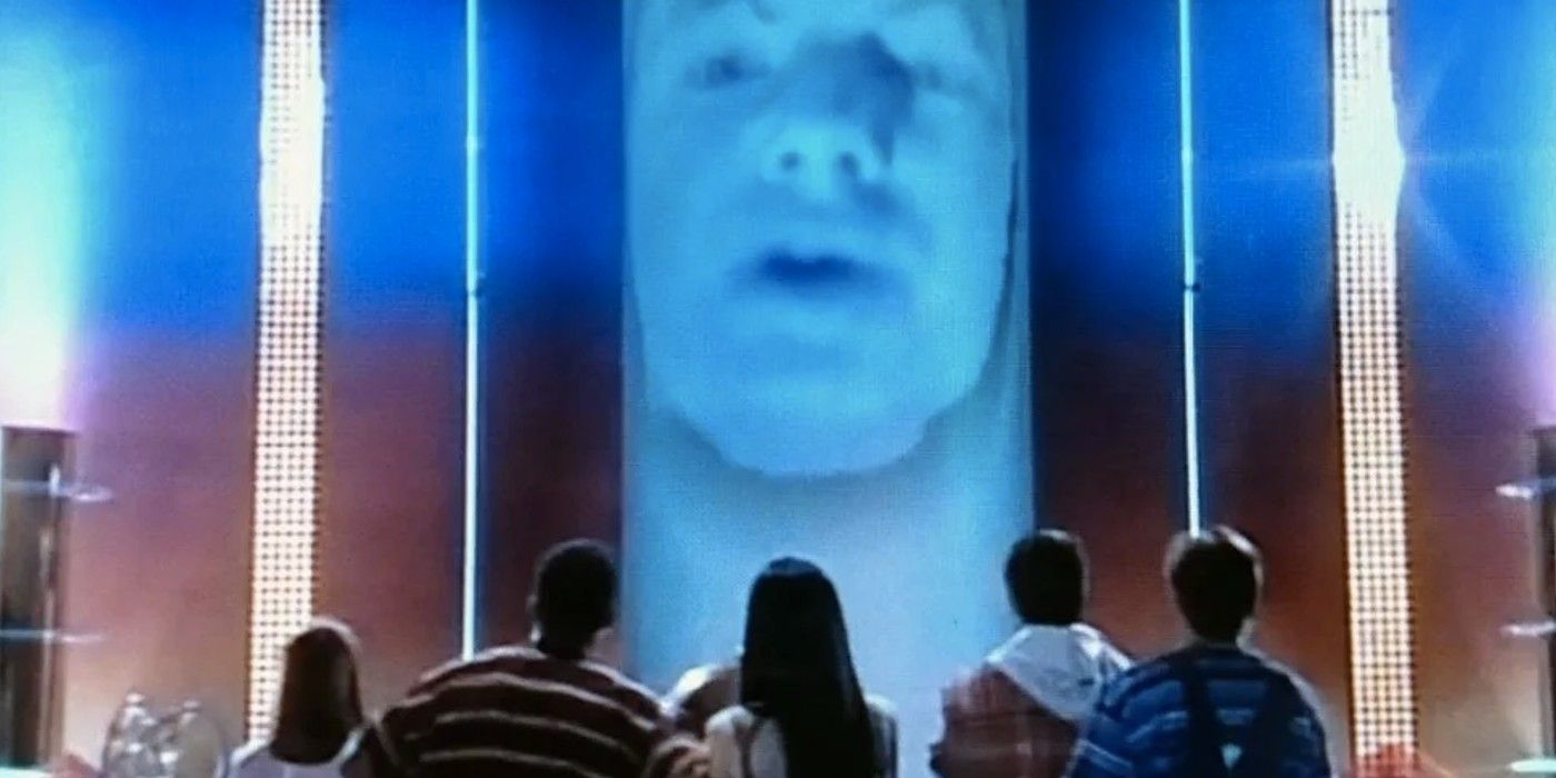 The original members of the Power Rangers staring up at Zordon in the Command Center in Mighty Morphin Power Rangers