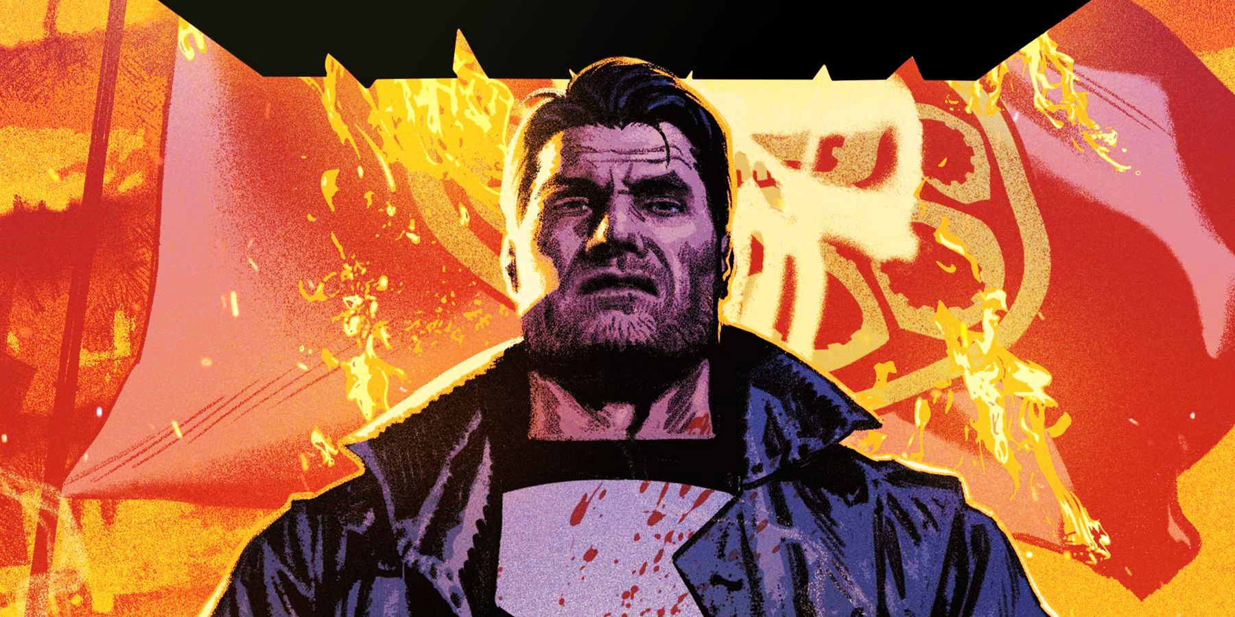 Frank Castle standing in front of a burning Hydra flag with the Punisher logo painted on it; the cover of The Punisher (2018) #12