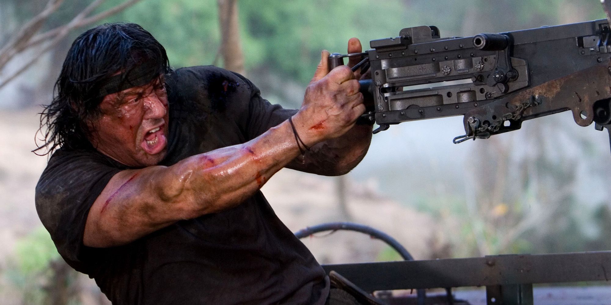 Sylvester Stallone firing a machine gun in Rambo