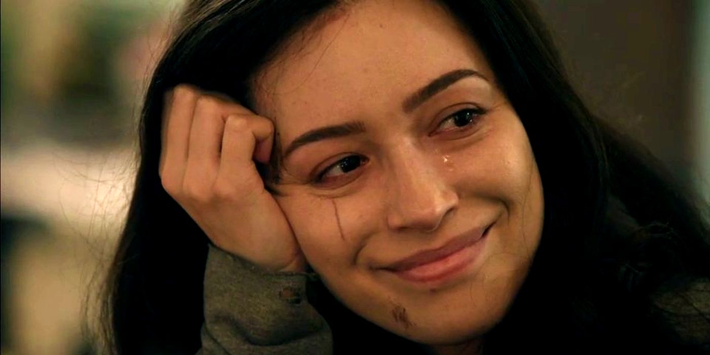 Rosita smiling sadly in The Walking Dead.