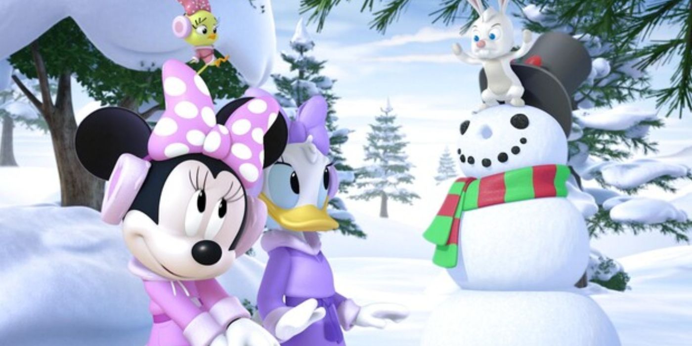 Minnie and Daisy stand next to a snowman with a rabbit on top in Nutty Tales. 