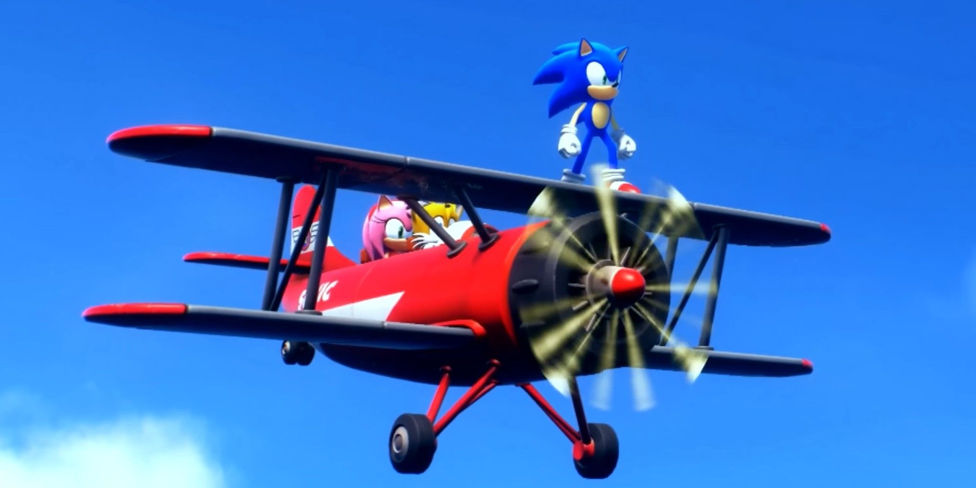Sonic Frontiers cutscene that features Sonic, Amy, and Tails on the Tornado, a biplane.