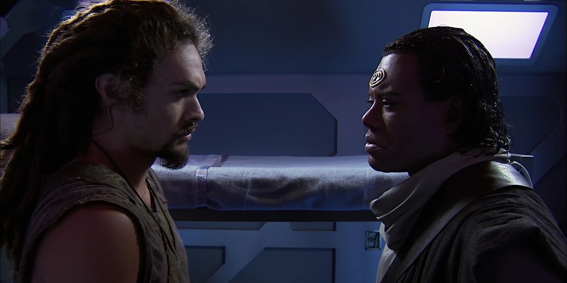 Tealc and Ronon stare at each other in Stargate Atlantis
