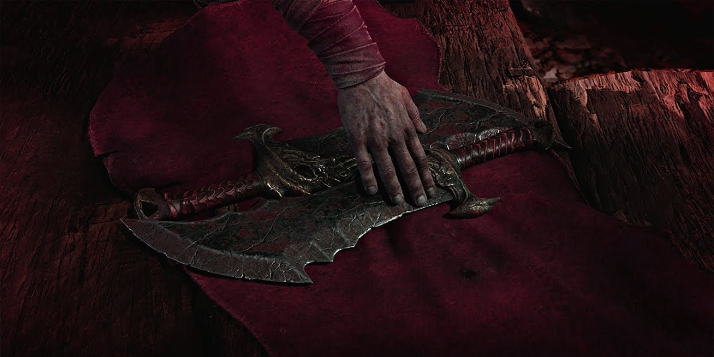 Kratos touching the Blades of Chaos