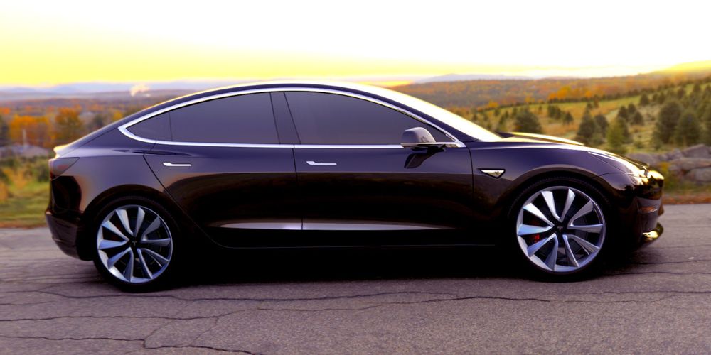 A black Tesla Model 3 is shown in profile
