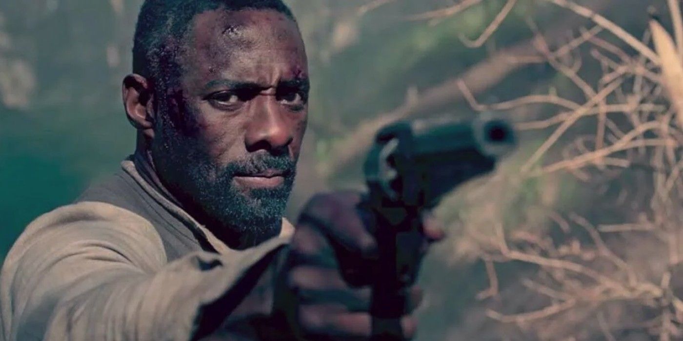 Idris Elba points a gun in The Dark Tower