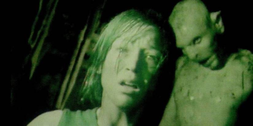 A character and a creature/crawler in The Descent