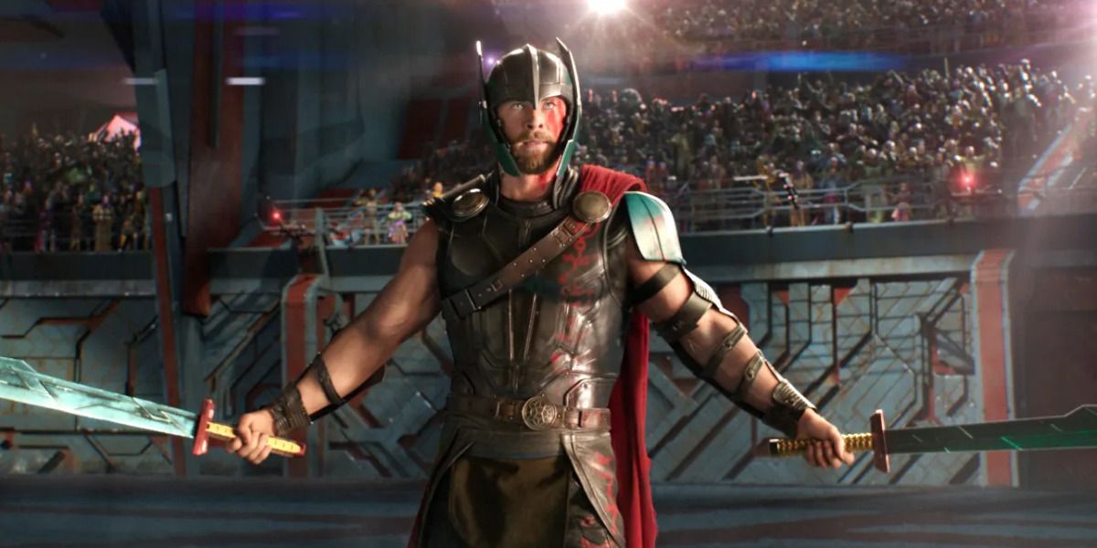 Uma foto do gladiador Thor em Ragnarok brandindo espadas é mostrada.