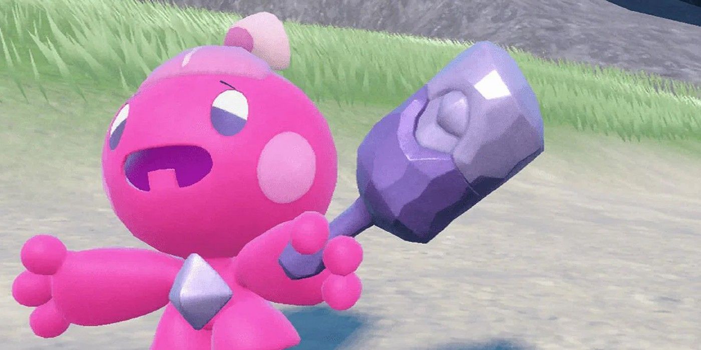 Uma imagem de Tinkaton segurando um martelo em Pokemon Scarlet e Violet. 
